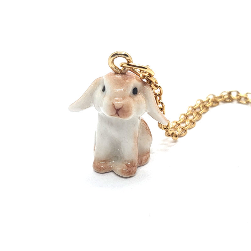 Close up of brown lop rabbit ceramic pendant