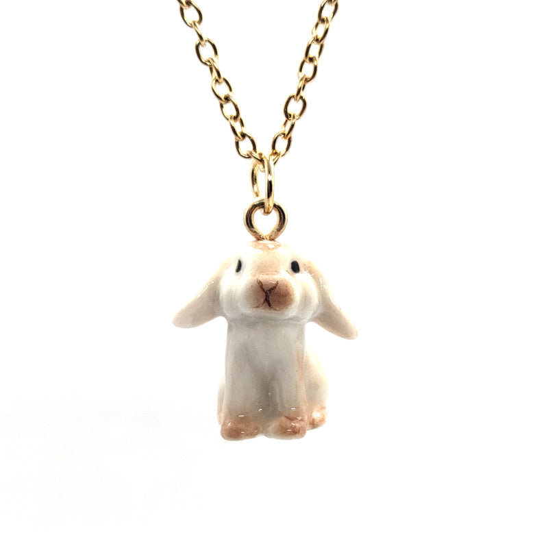 Front view of brown lop rabbit ceramic pendant