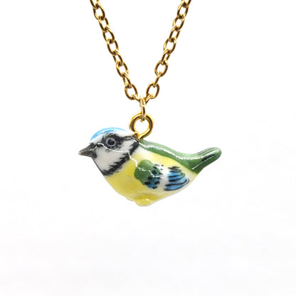 If you love songbirds, this beautiful Blue Tit necklace is perfect for you! Or get it as a gift for a bird enthusiast! Comes with a stainless steel or an 18K gold-plated cable chain. Blue Tit pendant is 13mm tall, 20mm long.